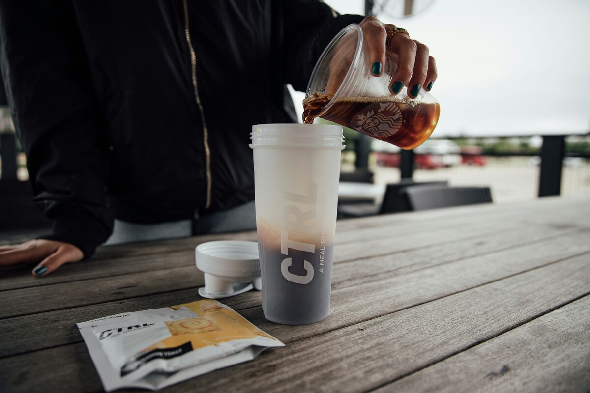 Person drinking protein shake after workout