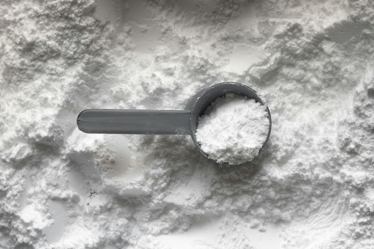 Scoop of creatine monohydrate powder