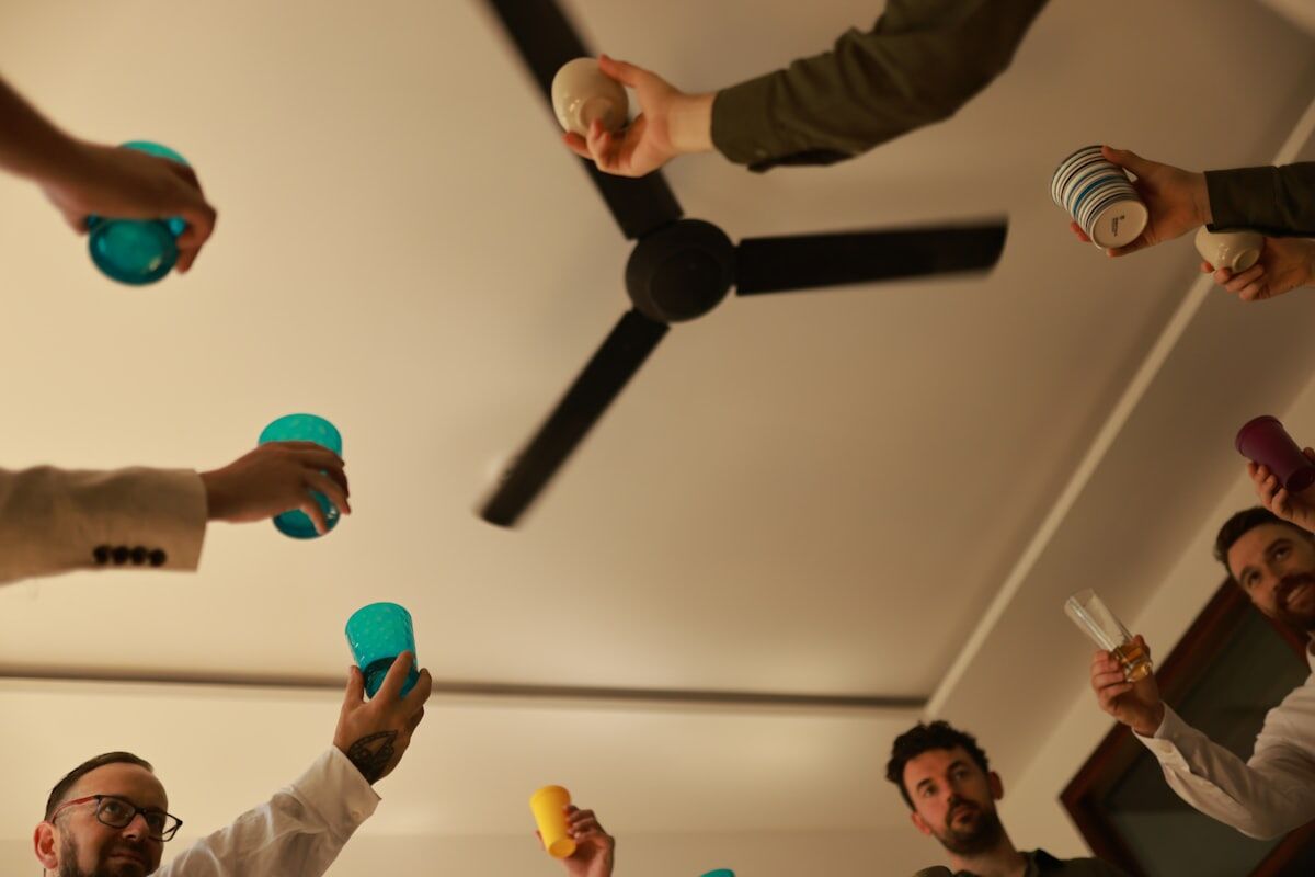 Toasting drinks at a social gathering
