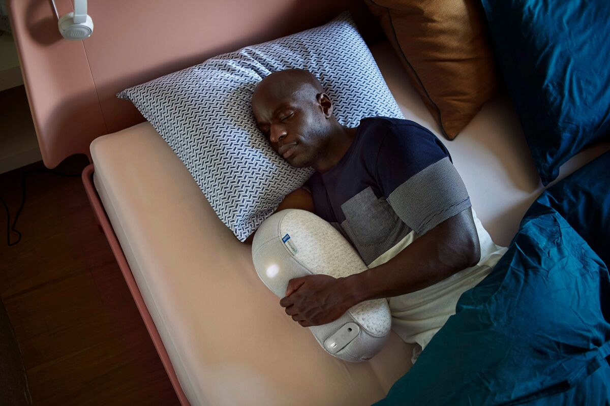 Man resting on bed - sleep recovery - fitness friday facts