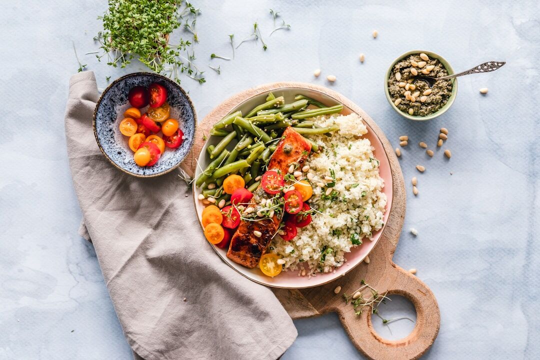 A balanced high protein salmon salad bowl showing nutrition and stress and muscle recovery support