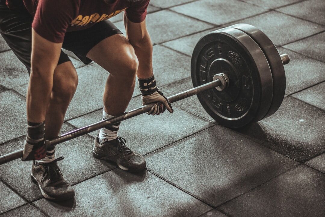 Athlete performing heavy deadlifts - pull day workout - workout wednesday