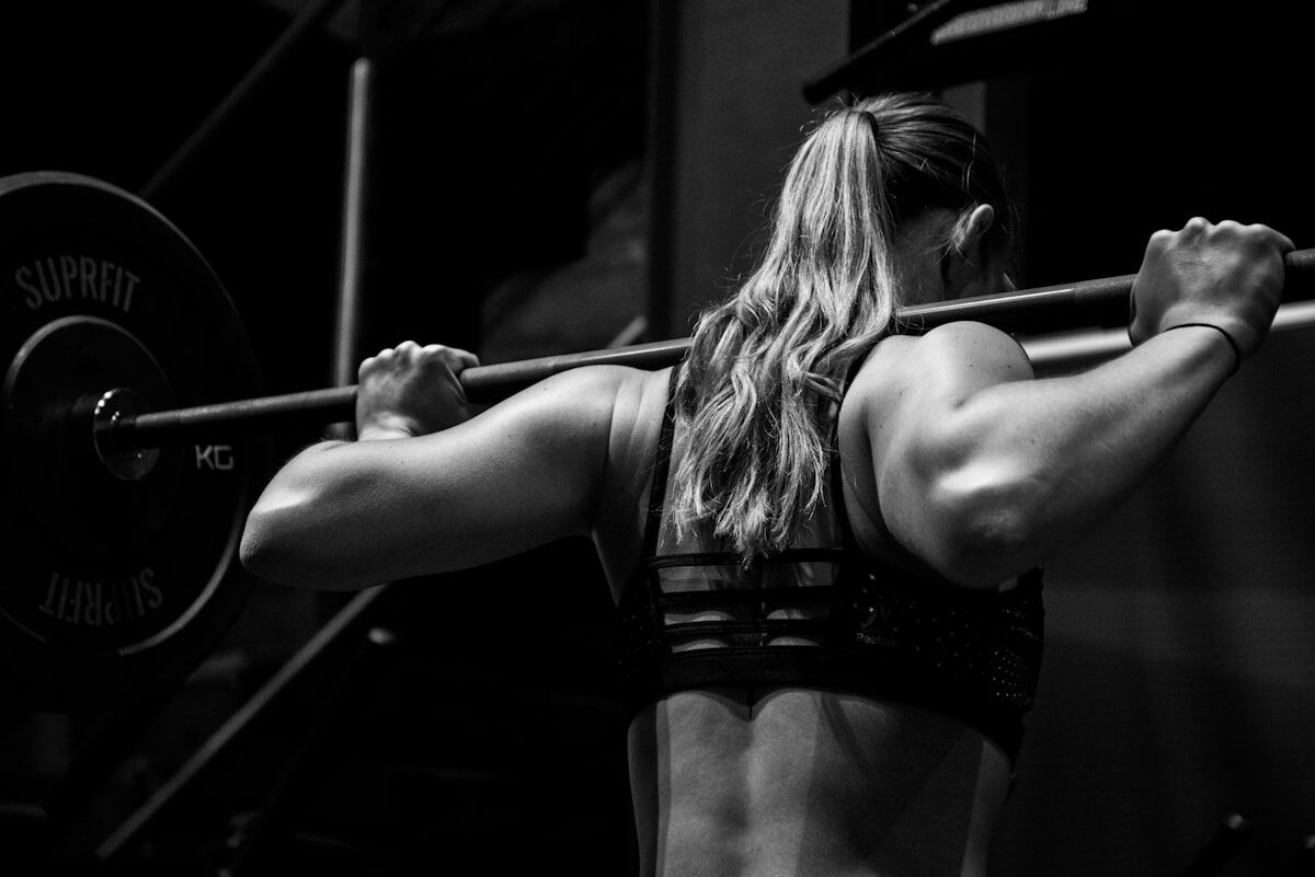 An athlete preparing for a workout in the gym.