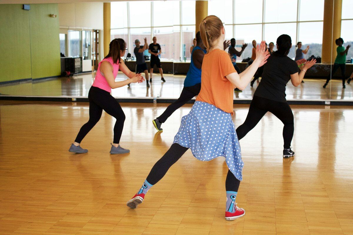 Group exercise class during high energy cardio workout - cardio myths - fitness friday facts